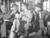 Anatomy Of A Murder Three Men Talking While sitting Outside the Station in Movie Scene in Black and White Photo Print - Item # VARCEL698298