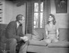Anatomy Of A Murder Woman Talking to a Guy While sitting on the Sofa in a Movie Scene in Black and White Photo Print - Item # VARCEL698301