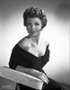 Rita Hayworth Leaning and Looking Side Ways Posed Photo Print - Item # VARCEL698309