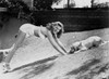Rita Hayworth Sexy Pose with a Dog Photo Print - Item # VARCEL698370