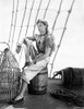 Frances Farmer sitting on a Barrel Portrait Photo Print - Item # VARCEL698381