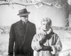 Imitation Of Life Lady in Furry Coat with Man in Black Suit with Hat Photo Print - Item # VARCEL698386
