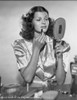 Portrait of Rita Hayworth with lipstick on Hand Photo Print - Item # VARCEL698402
