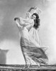 Rita Hayworth wearing a Gown with a Daring Pose Photo Print - Item # VARCEL698546