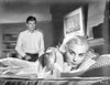 Home Before Dark Lady Lying and Man in Long Sleeve Polo Photo Print - Item # VARCEL698544