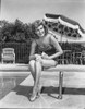 Rita Hayworth posed with in Black and White Photo Print - Item # VARCEL698582