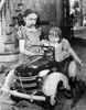 Clare Foley Kid with a Toy Car and Doll Portrait Photo Print - Item # VARCEL698597