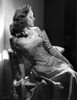Carol Forman on a Checkered Off-Shoulder Top Looking Below Portrait Photo Print - Item # VARCEL698681