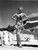 Eva Gabor on a Printed Dress with Hands on Waist Photo Print - Item # VARCEL698868