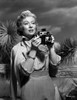 Greer Garson on a Silk Dress Holding a Camera Photo Print - Item # VARCEL698920