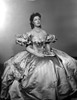 Greer Garson on a Silk Ball Gown sitting Photo Print - Item # VARCEL698909
