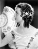 Janet Gaynor on a Dress with Fan and Head on Side view Portrait Photo Print - Item # VARCEL698982