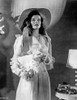 Katharine Hepburn posed in White Dress with Hat Photo Print - Item # VARCEL699039