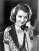 A portrait of Janet Gaynor talking on the telephone Photo Print - Item # VARCEL699065
