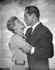 Rome Adventure Man in Suit Holding Woman's Arms Photo Print - Item # VARCEL699149