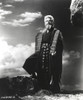 Charlton Heston standing in Red Dress while Carrying Two Holy Stone - A film still from The Ten Commandments Photo Print - Item # VARCEL699262