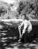 Virginia Grey sitting on a Chair Portrait Photo Print - Item # VARCEL699472