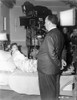 Hitchcock Alfred Filming a Lady on Bed Photograph Print Photo Print - Item # VARCEL699671