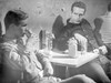 Hud Classic Two Men Drinking and Talking Photo Print