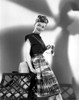 Gloria Henry on a Printed Skirt Leaning on a Chair Portrait Photo Print - Item # VARCEL699886