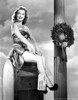 Gloria Henry on a Silk Tube sitting Portrait Photo Print - Item # VARCEL699896