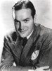 Bob Hope smiling wearing Formal Suit Portrait with White Background Photo Print - Item # VARCEL699955
