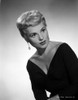 Judy Holliday wearing a V-Neck Dress in a Portrait Photo Print - Item # VARCEL700028