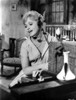 Judy Holliday wearing a House Dress and singing in a Portrait Photo Print - Item # VARCEL700068