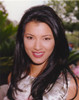 Kelly Hu smiling - smiling in a Portrait wearing Silver Silk Dress Photo Print - Item # VARCEL700175
