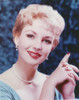 Portrait of Kathleen Hughes Pose with Necklace Pearl and Blue Dress Photo Print - Item # VARCEL700211