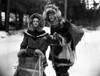 Rochelle Hudson and a man in the snow Photo Print - Item # VARCEL700233