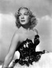 Betty Hutton on an Embroidered Top sitting Photo Print - Item # VARCEL700391