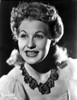 Betty Hutton Leaning with a Flower Portrait Photo Print - Item # VARCEL700432