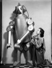 Lois January Kneeling Before the Robot Photo Print - Item # VARCEL700492
