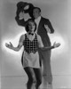Al Jolson posed with a Woman in Front wearing a Suit Photo Print - Item # VARCEL700685