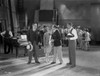 Al Jolson Discussing in a Group Inside the Studio in a Classic Movie Scene Photo Print - Item # VARCEL700724