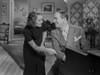 Al Jolson Playing the Piano for a Pretty Woman in a Classic Movie Scene Photo Print - Item # VARCEL700772
