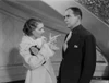 Al Jolson Talking with the Woman in White in a Classic Movie Scene Photo Print - Item # VARCEL700795