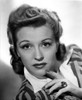 Nancy Kelly on a Stripe Top and Finger on Chin Photo Print - Item # VARCEL700820