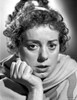 Elsa Lancaster on a Printed Top and Face Leaning on Closed Hands Photo Print - Item # VARCEL701033