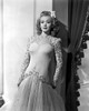 Carole Landis on Embroidered Dress and Leaning Photo Print - Item # VARCEL701077