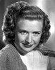 Priscilla Lane on a Knitted Top and Smirking Photo Print - Item # VARCEL701158