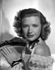 Priscilla Lane on an Off-Shoulder Lace posed Photo Print - Item # VARCEL701166
