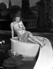 Rosemary Lane Sipping on a Straw and sitting Photo Print - Item # VARCEL701186