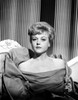 Angela Lansbury sitting on the Chair wearing a Dress Photo Print - Item # VARCEL701228
