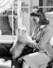 Joan Leslie on a Blazer and Holding a Dog Photo Print - Item # VARCEL701405