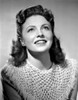 Joan Leslie on an Knitted Top and Looking Up Photo Print - Item # VARCEL701395