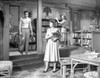 From Here To Eternity Woman standing in Brown Dress Photo Print - Item # VARCEL701545