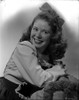 Marcy McGuire on a Long Sleeve sitting and laughing Photo Print - Item # VARCEL701643