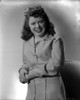 Marcy McGuire on a Long Sleeve Top Leaning and smiling Photo Print - Item # VARCEL701647